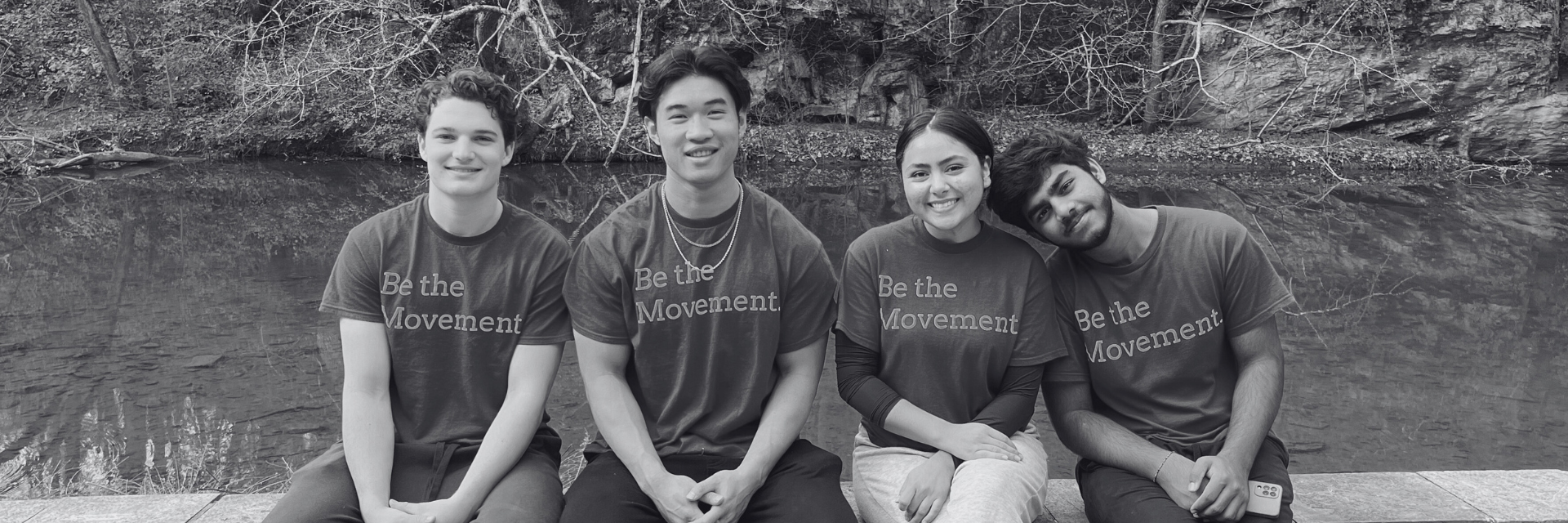 Four Alternative Break Volunteers taking a photo together. Their shirts say "Be The Movement."