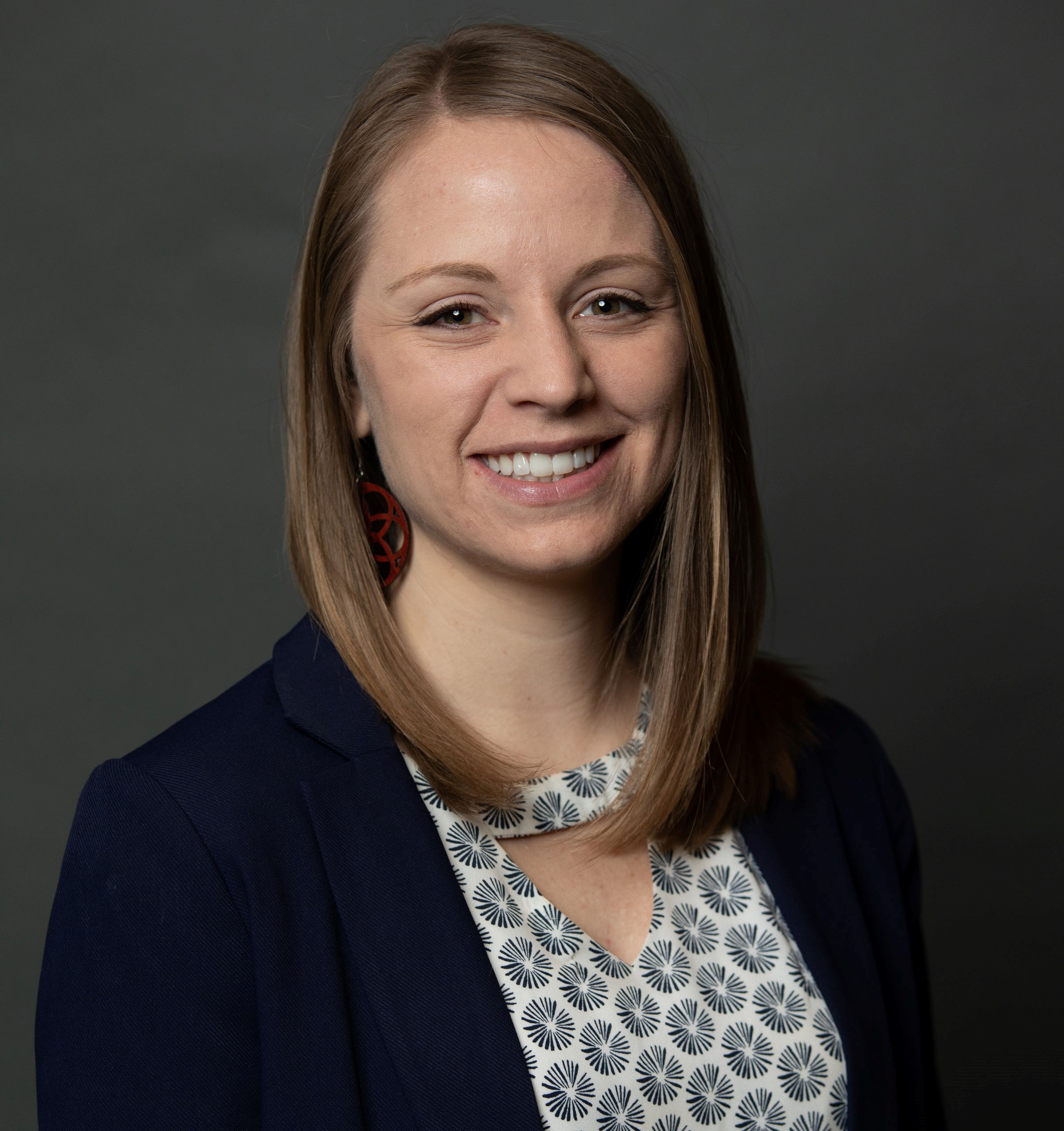 photo of Courtney with gray background