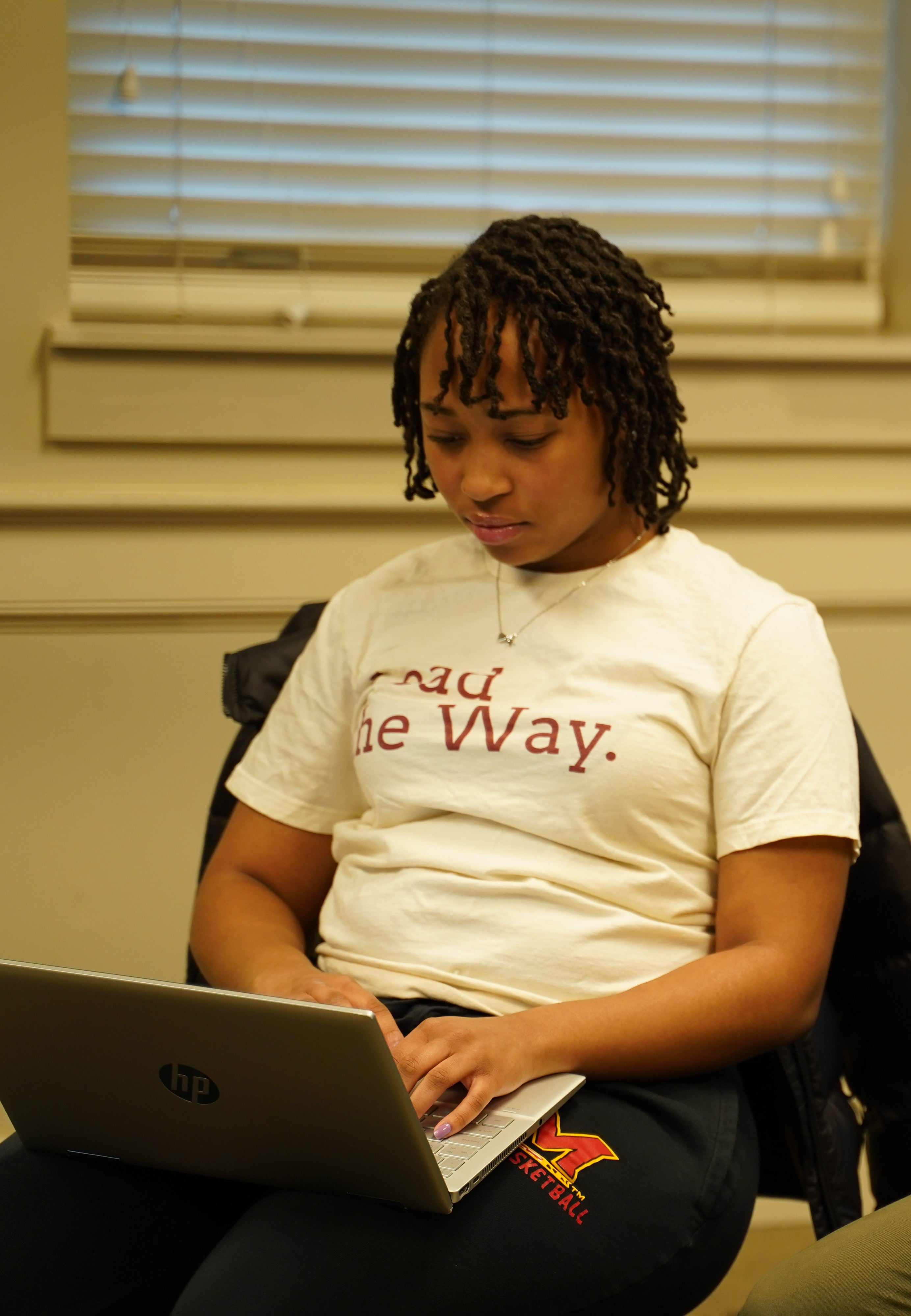 Picture of intern working on laptop.