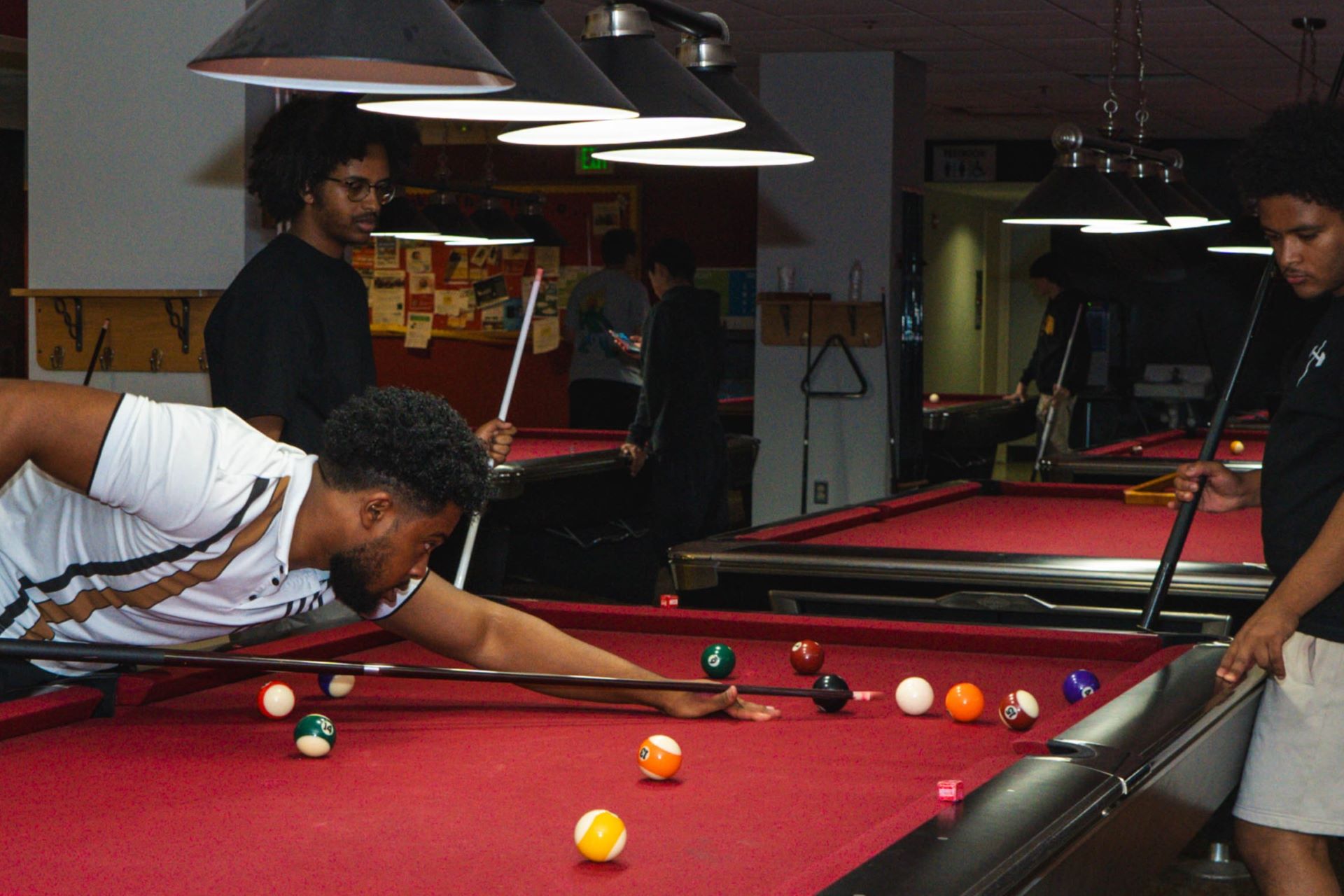 people playing pool