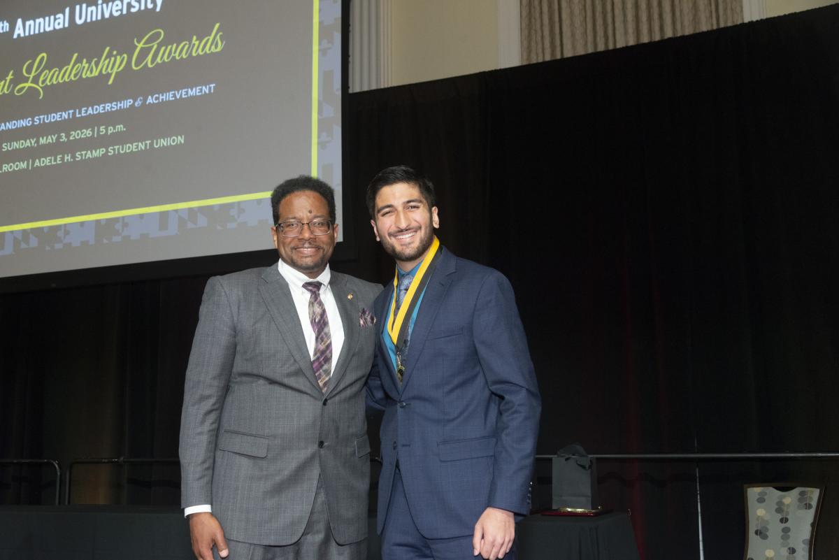 President Pines and a member of the maryland medallion society