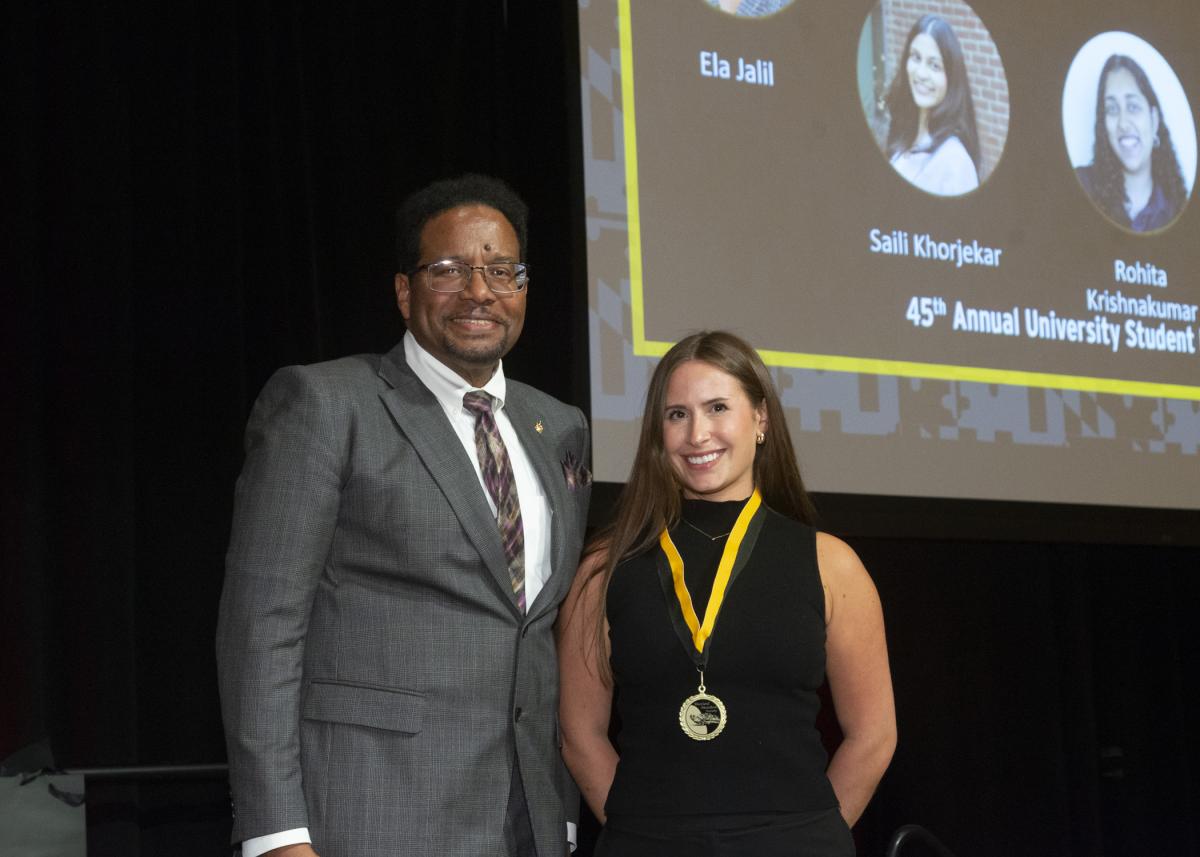 President Pines and a member of the maryland medallion society
