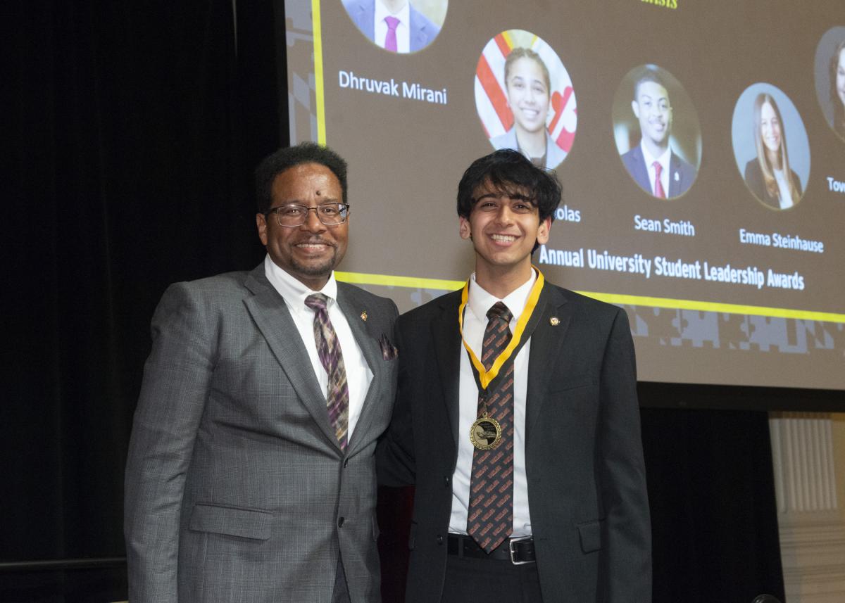 President Pines and a member of the maryland medallion society