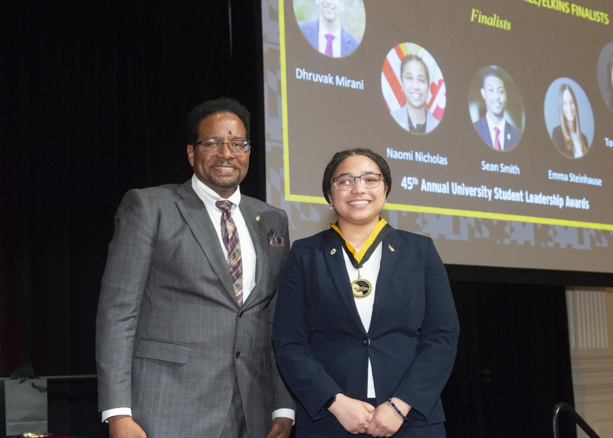 President Pines and a member of the maryland medallion society