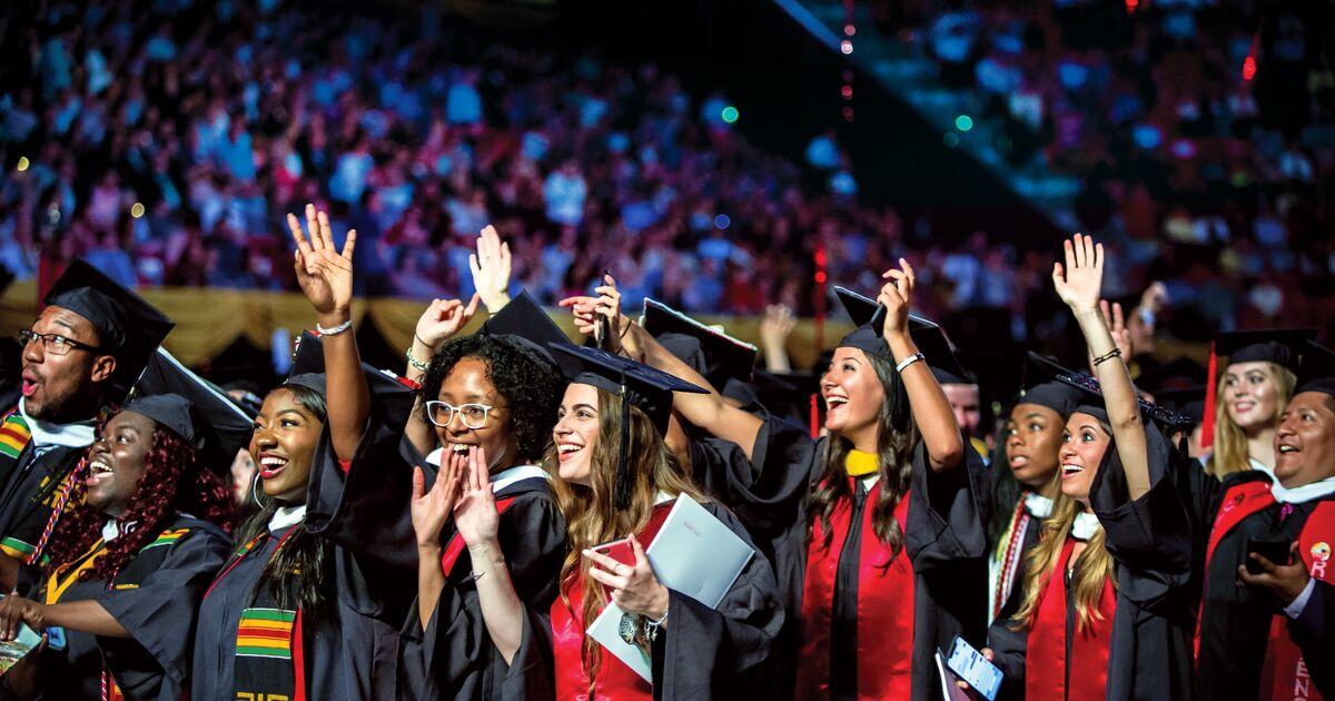 Group of cheering graduating University of Maryland students