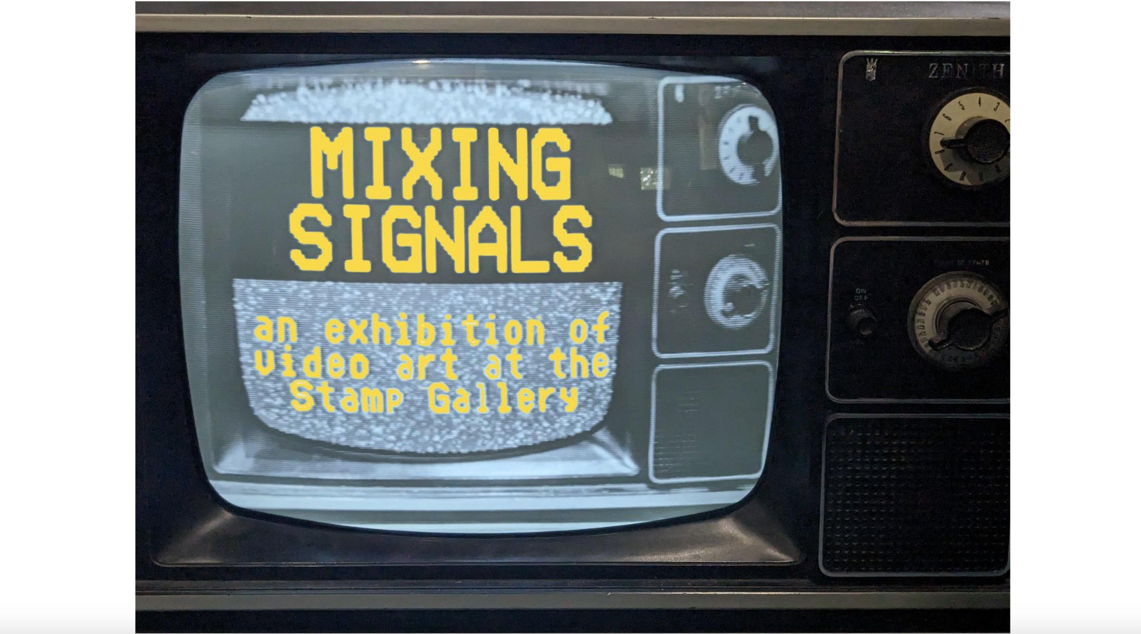 Image of old-fashioned TV bearing the words "Mixing Signals: an exhibition of video art at the Stamp Gallery" displayed from another TV 