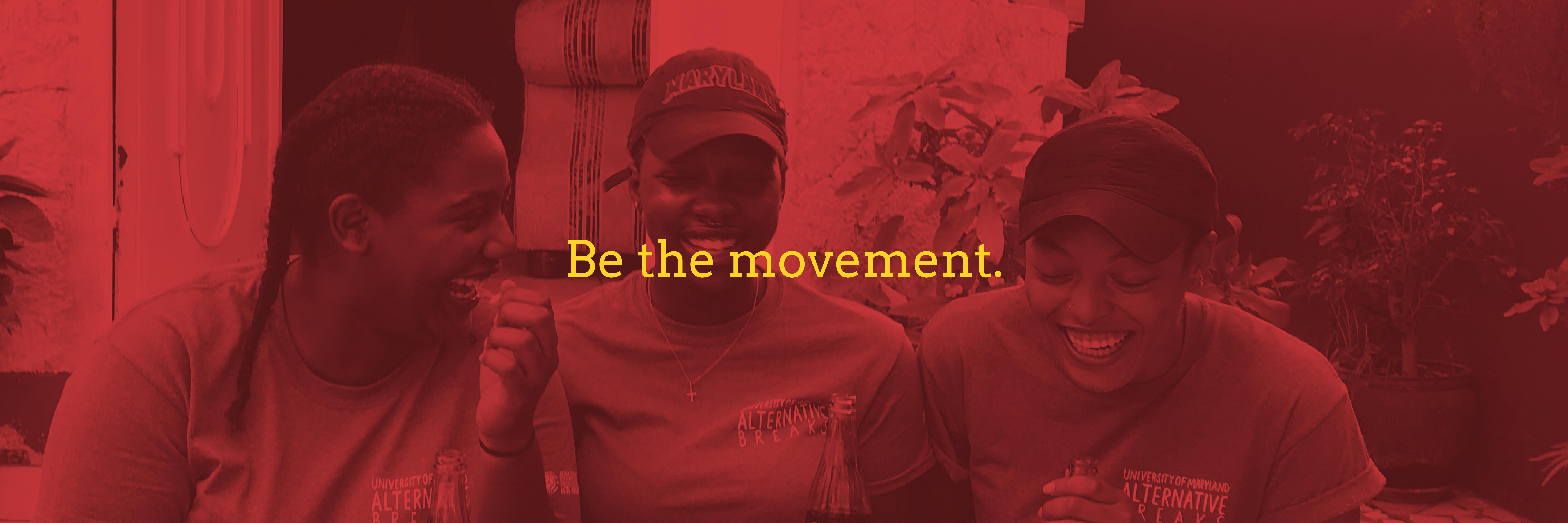 The text "Be the movement." superimposed on an image of three students