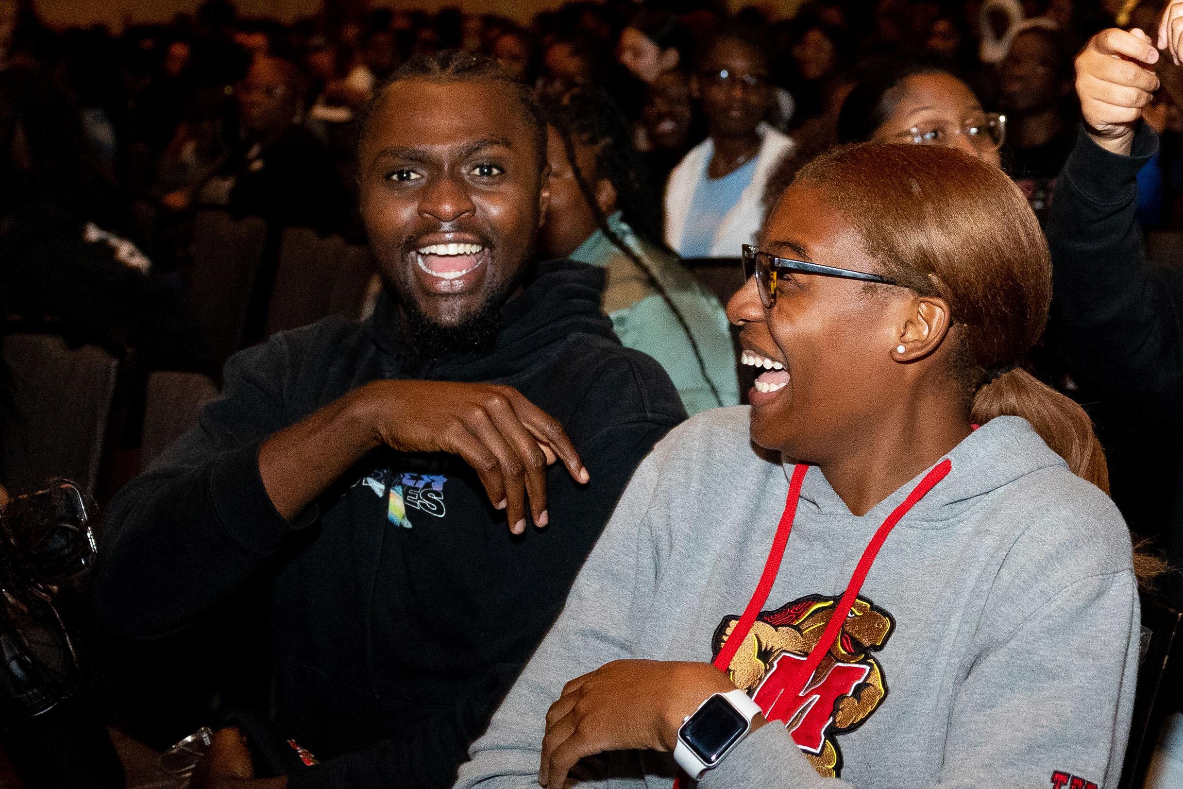 two students laughing