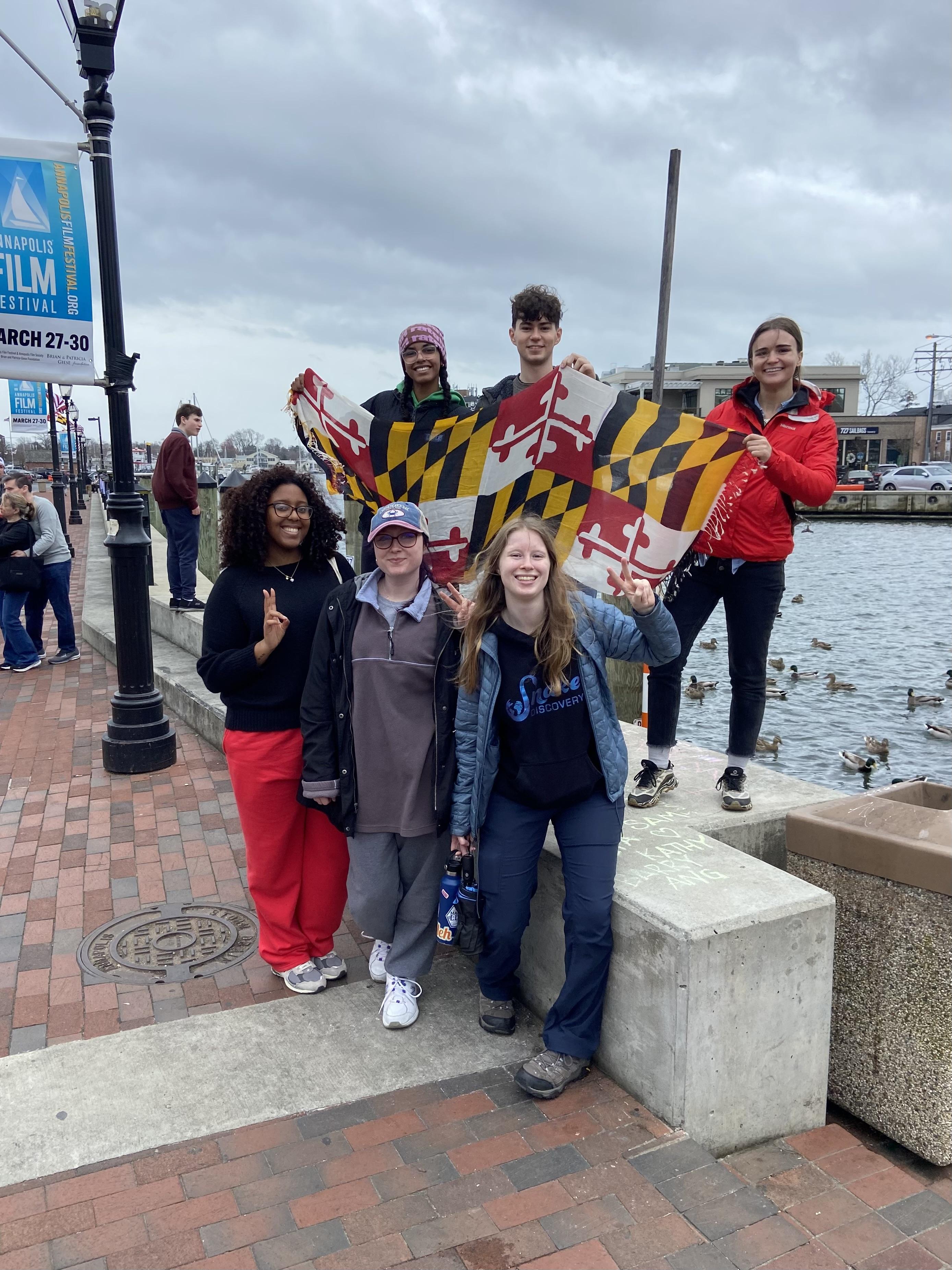 students with MD flag