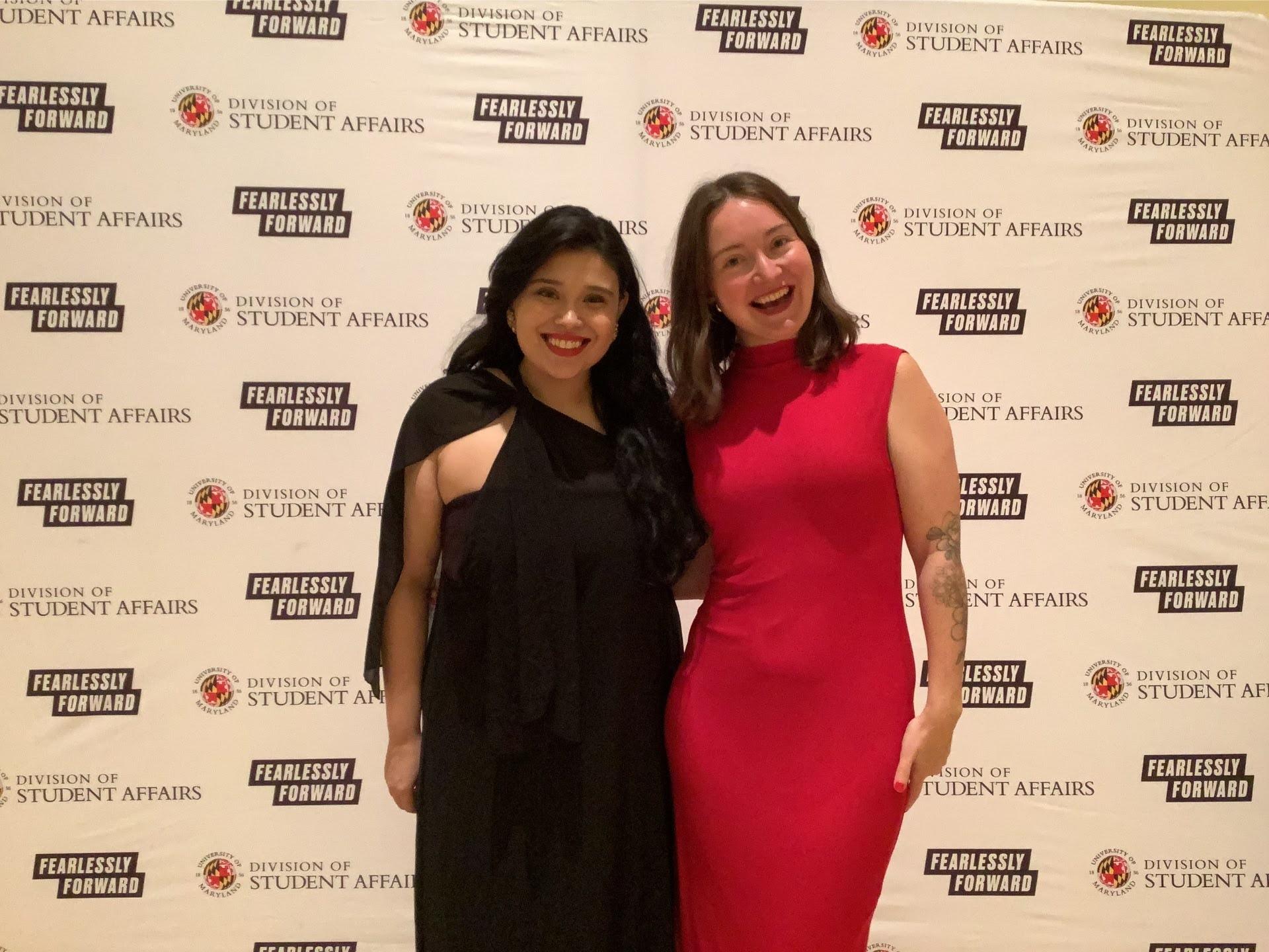 A photobooth photo of one of the award recipients and her guest