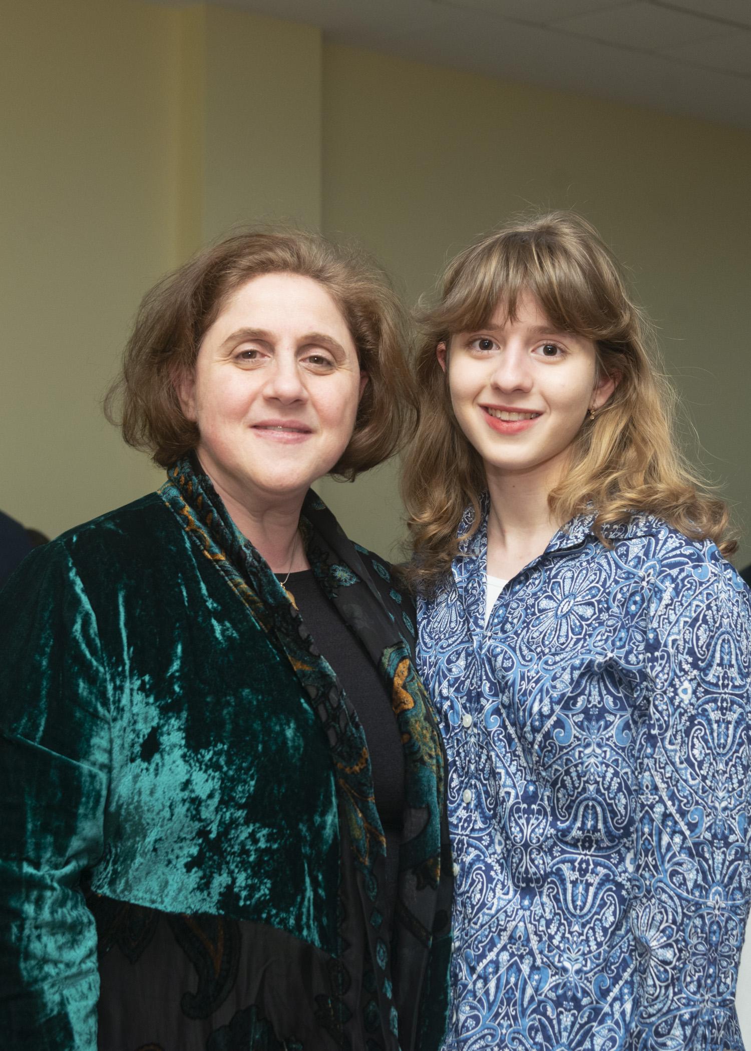 Photo of 2 attendees in the reception area