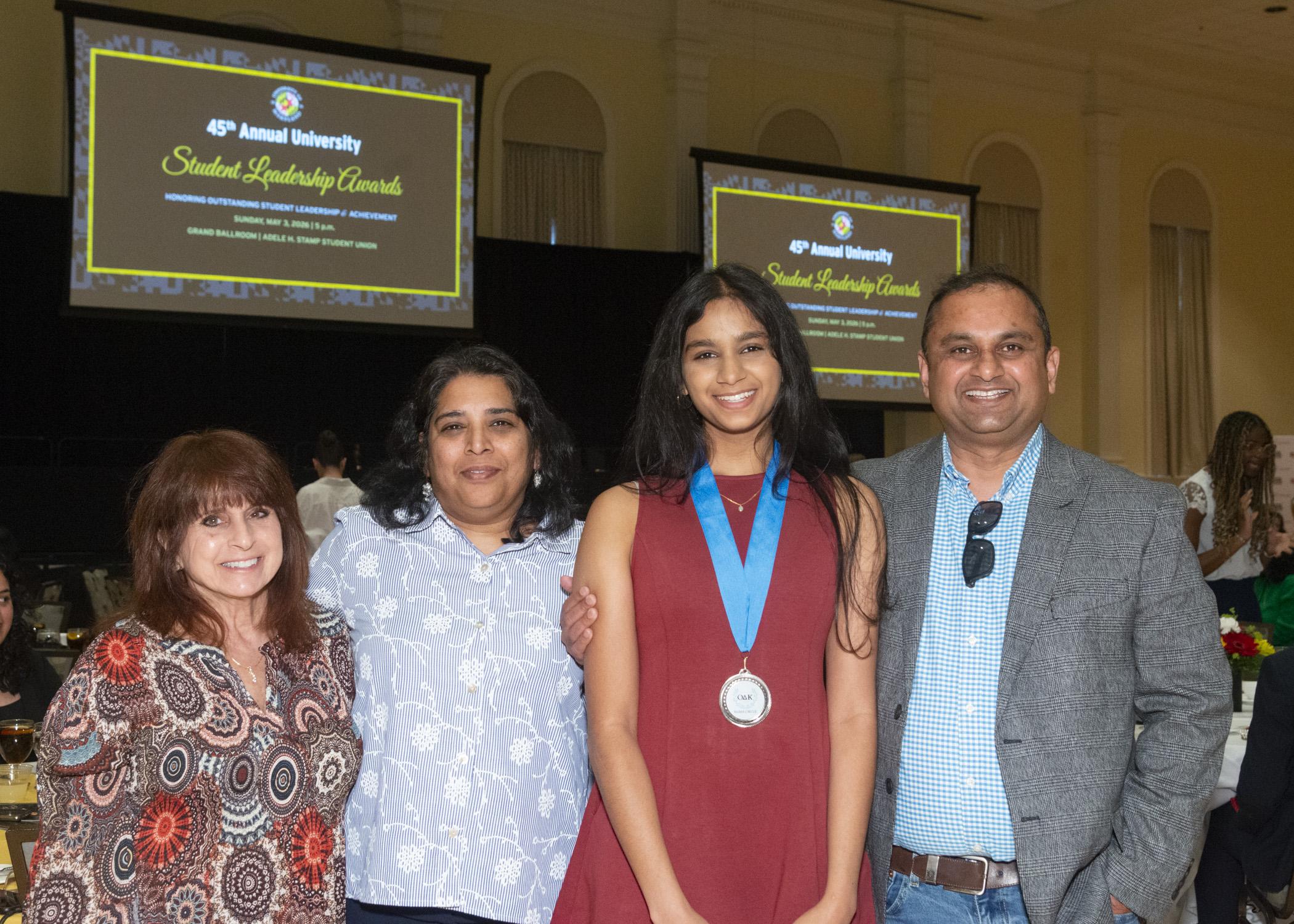 Photo of an ODK TOp Ten Freshman recipient and her guests