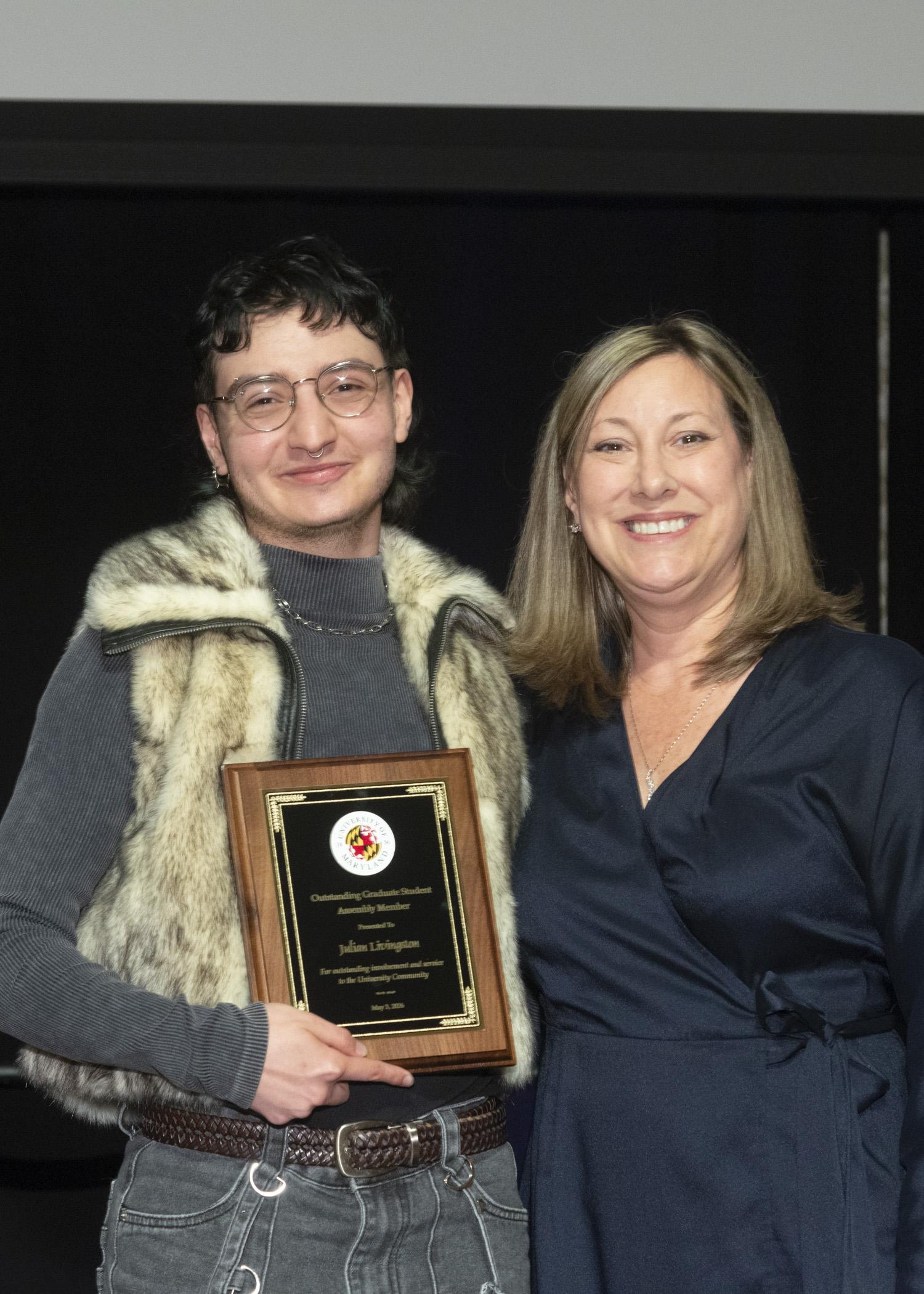 A photo of the Outstanding Graduate Assembly member award recipient