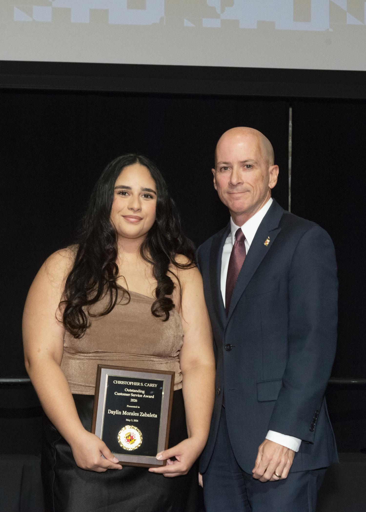 A photo of the Outstanding customer service award recipient