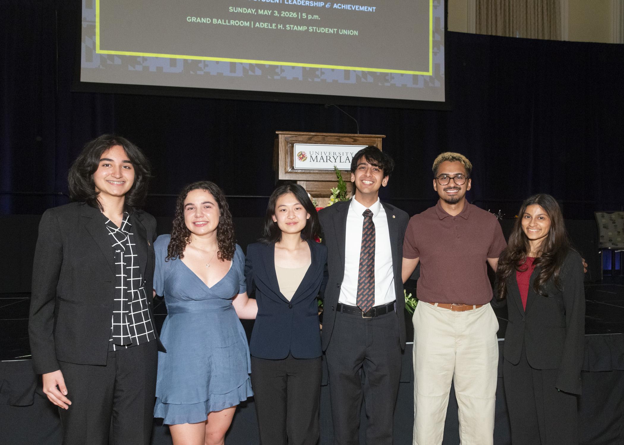 6 award recipients posing for a group photo