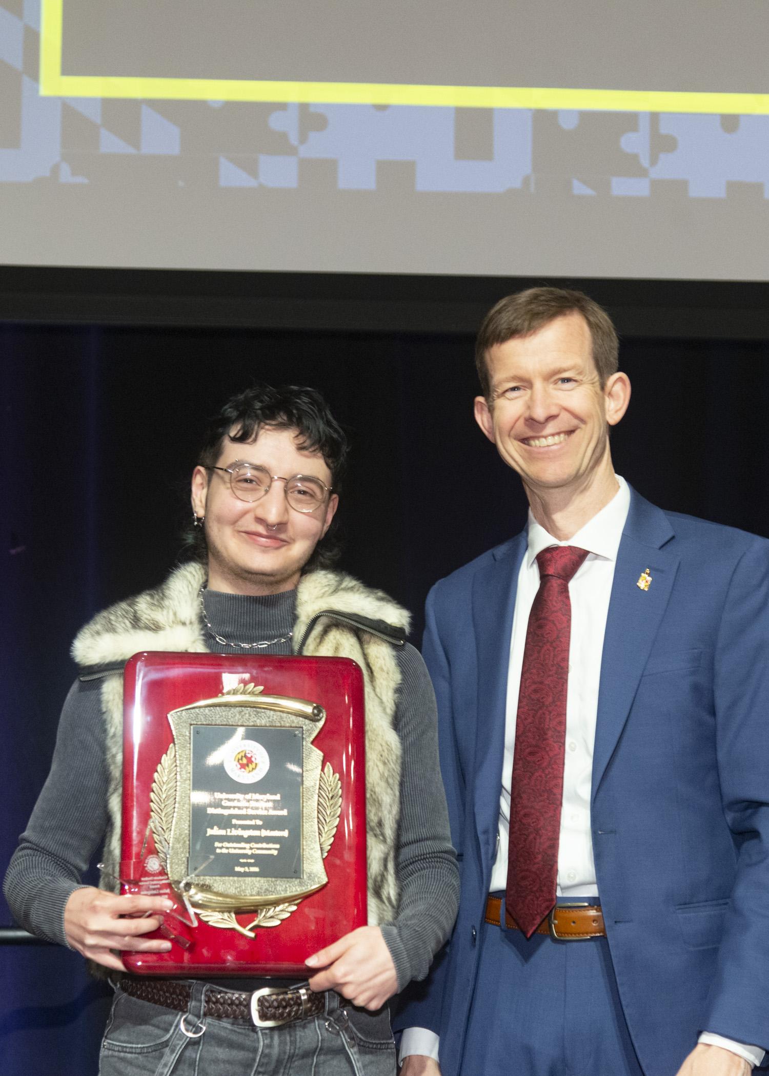 A photo of the Masters Outstanding Graduate Student award recipient 