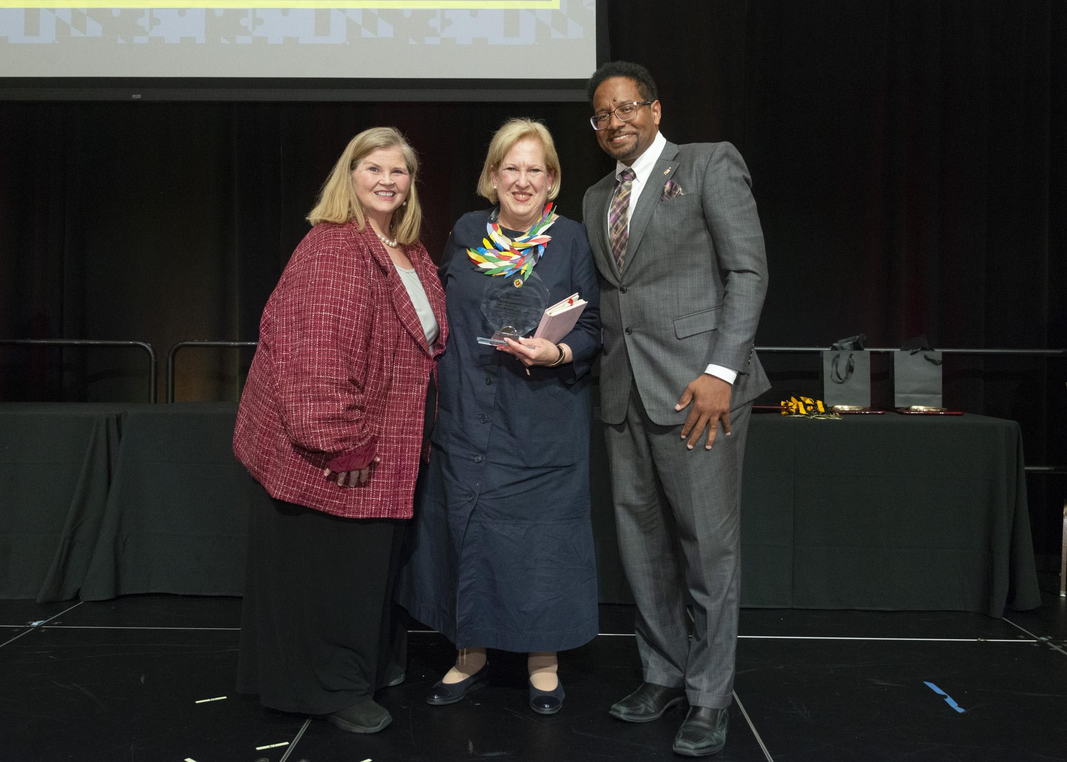 Photo of Patty Perillo, VP for Student Affairs, Directo of Stamp, Marsha Guenzeler-Stevens and President Pines
