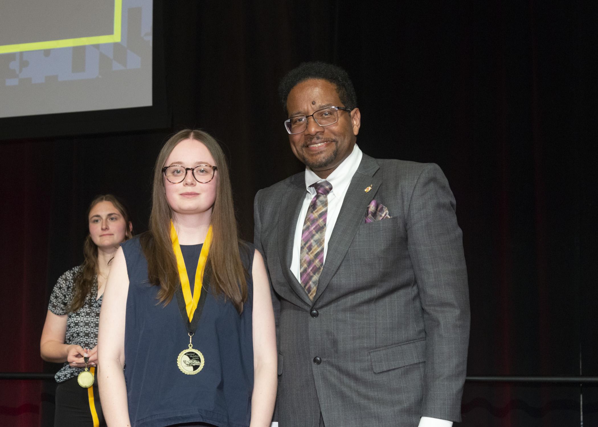 President Pines and a member of the maryland medallion society
