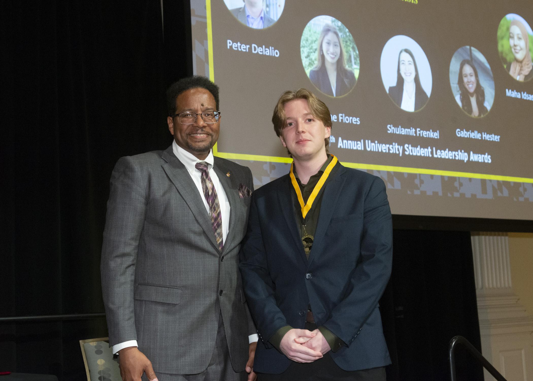 President Pines and a member of the maryland medallion society