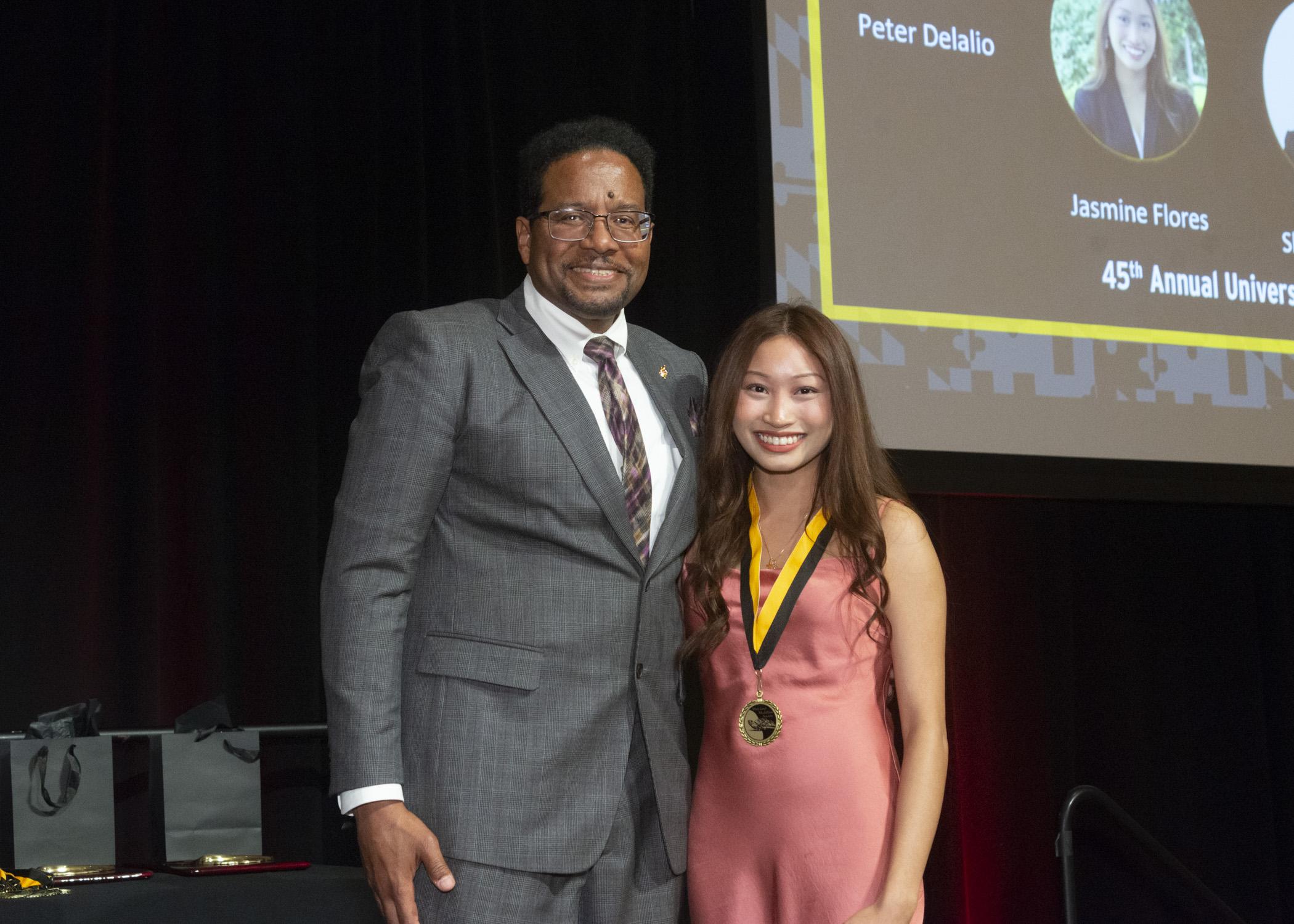 President Pines and a member of the maryland medallion society