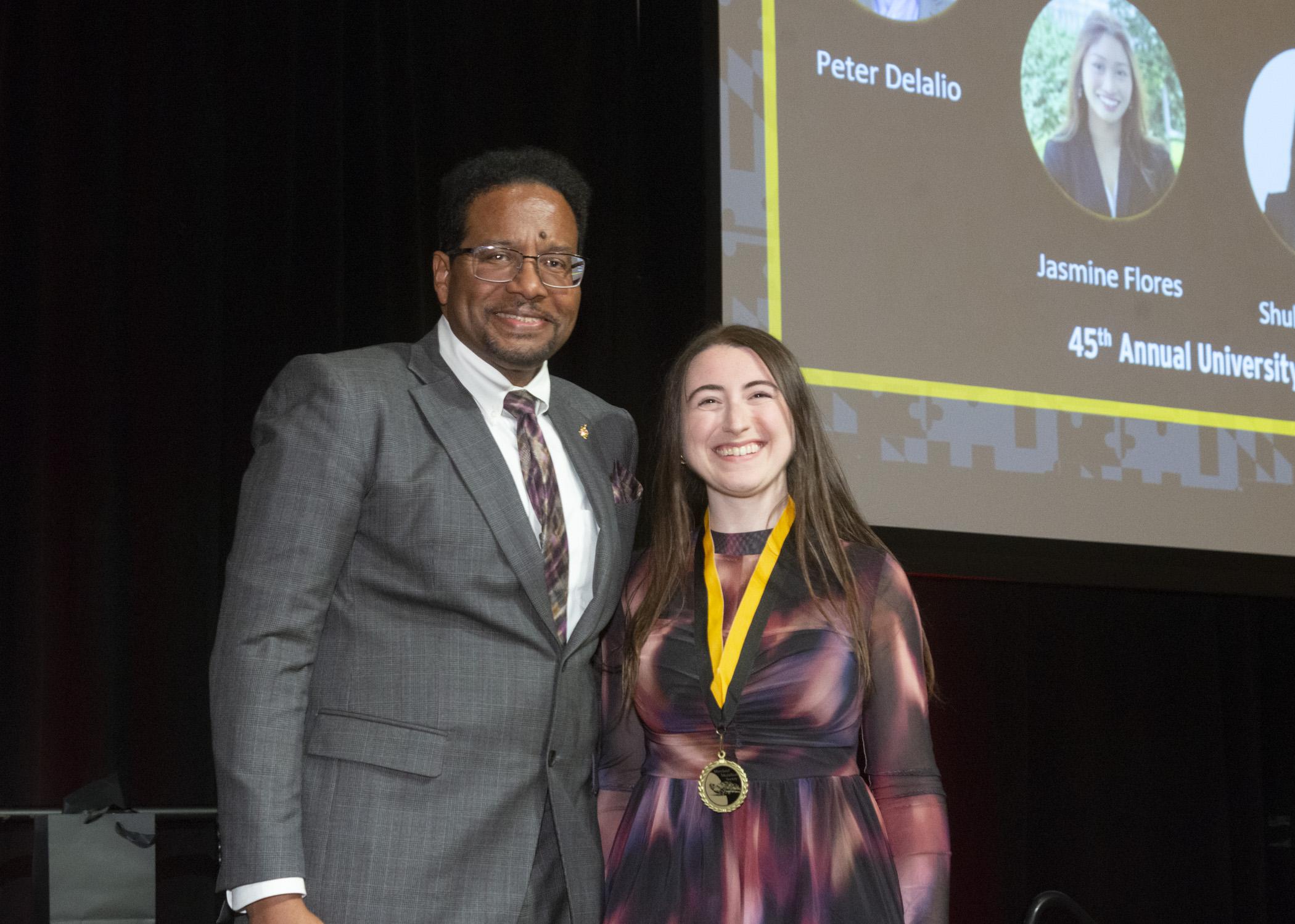 President Pines and a member of the maryland medallion society
