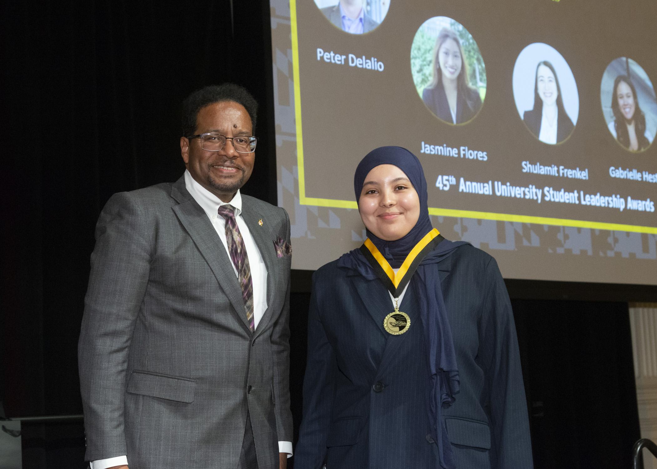 President Pines and a member of the maryland medallion society