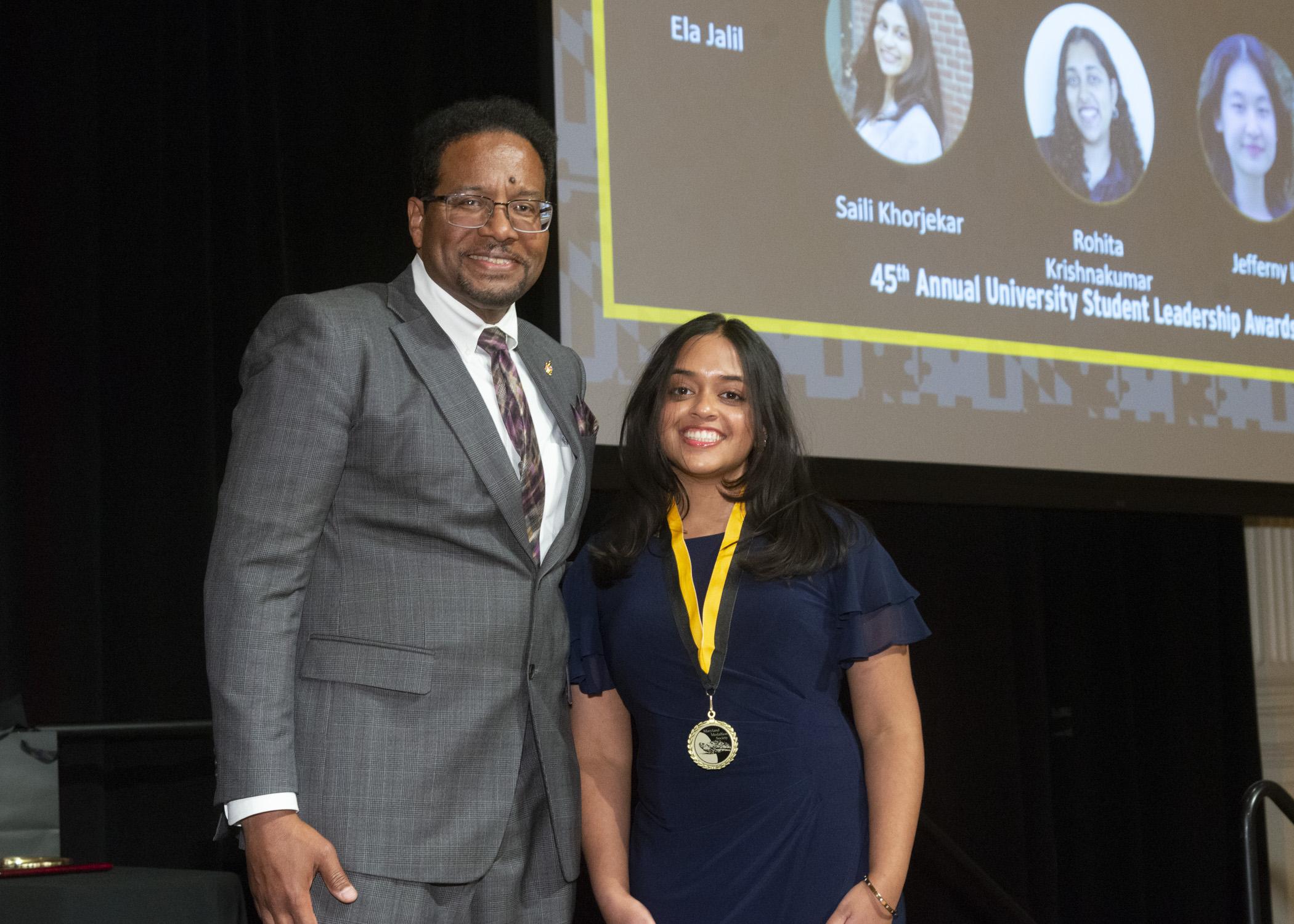 President Pines and a member of the maryland medallion society