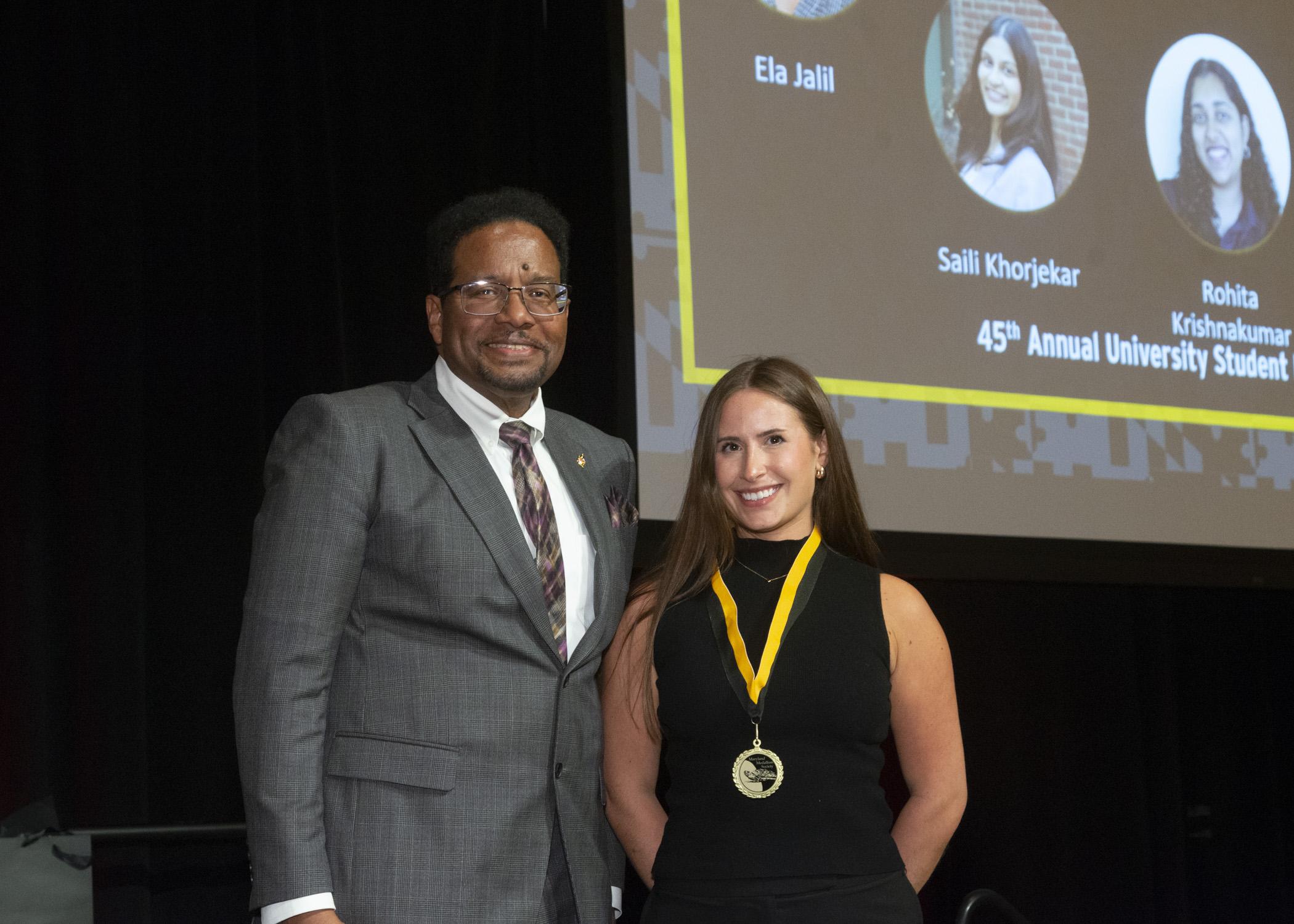 President Pines and a member of the maryland medallion society