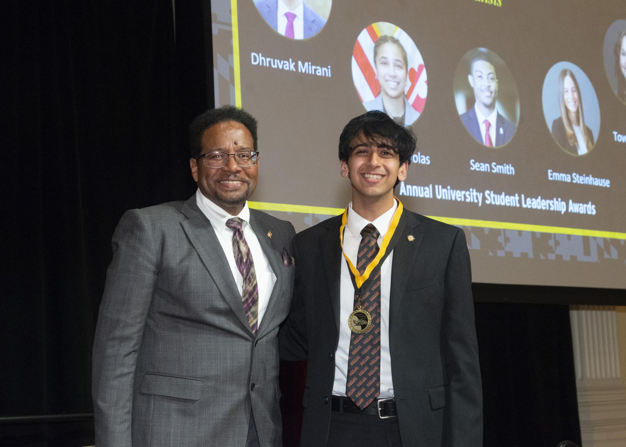 President Pines and a member of the maryland medallion society