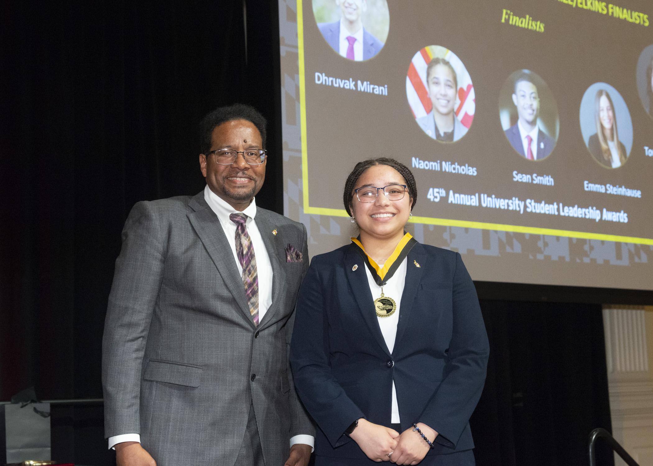 President Pines and a member of the maryland medallion society