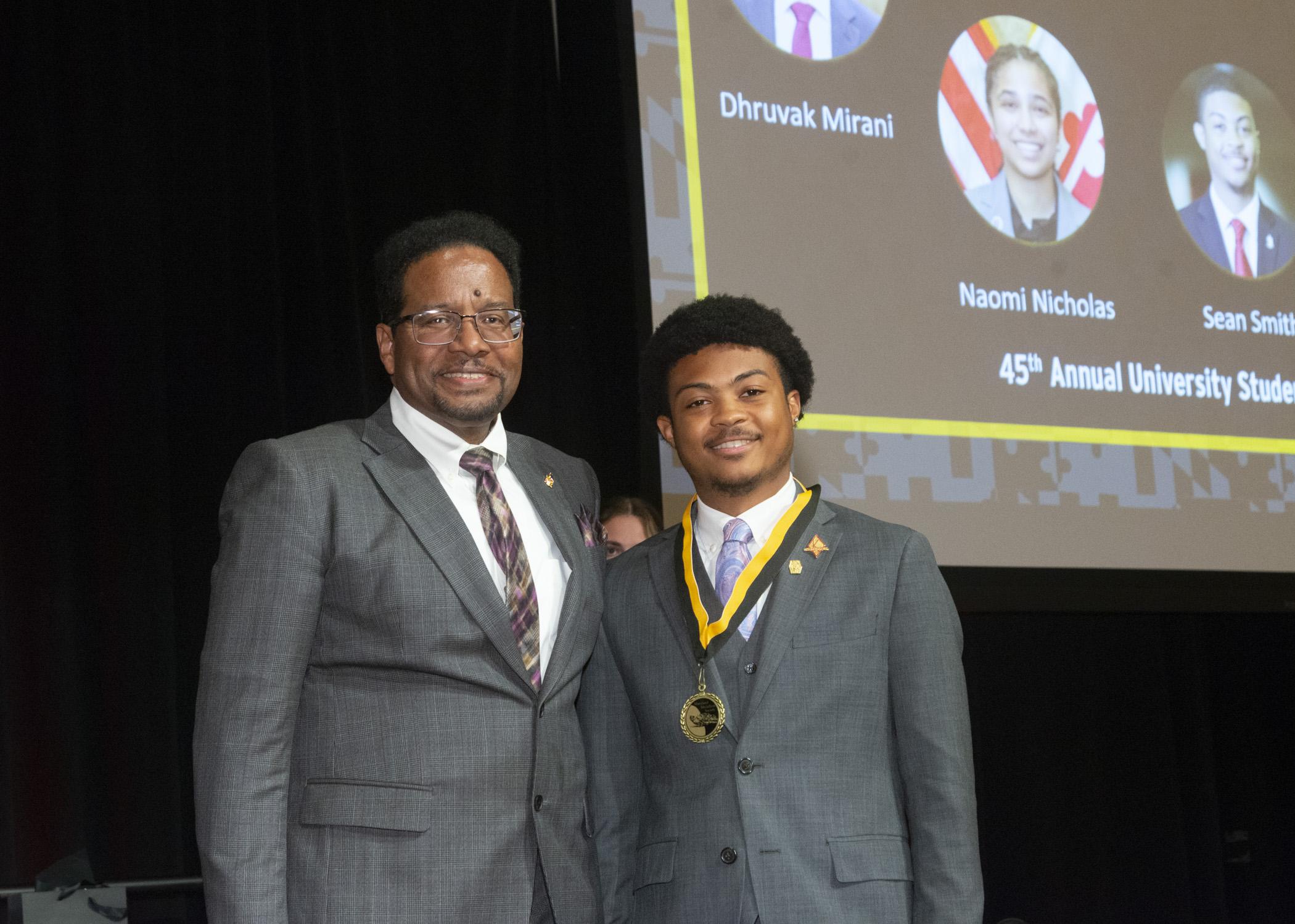President Pines and a member of the maryland medallion society