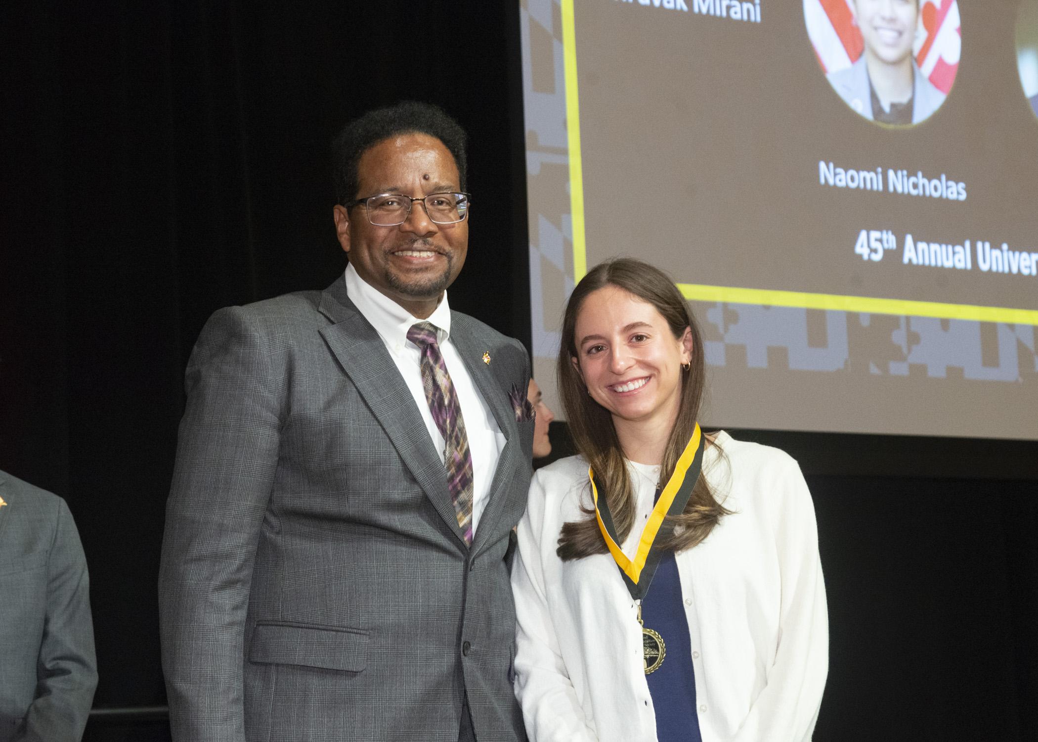 President Pines and a member of the maryland medallion society