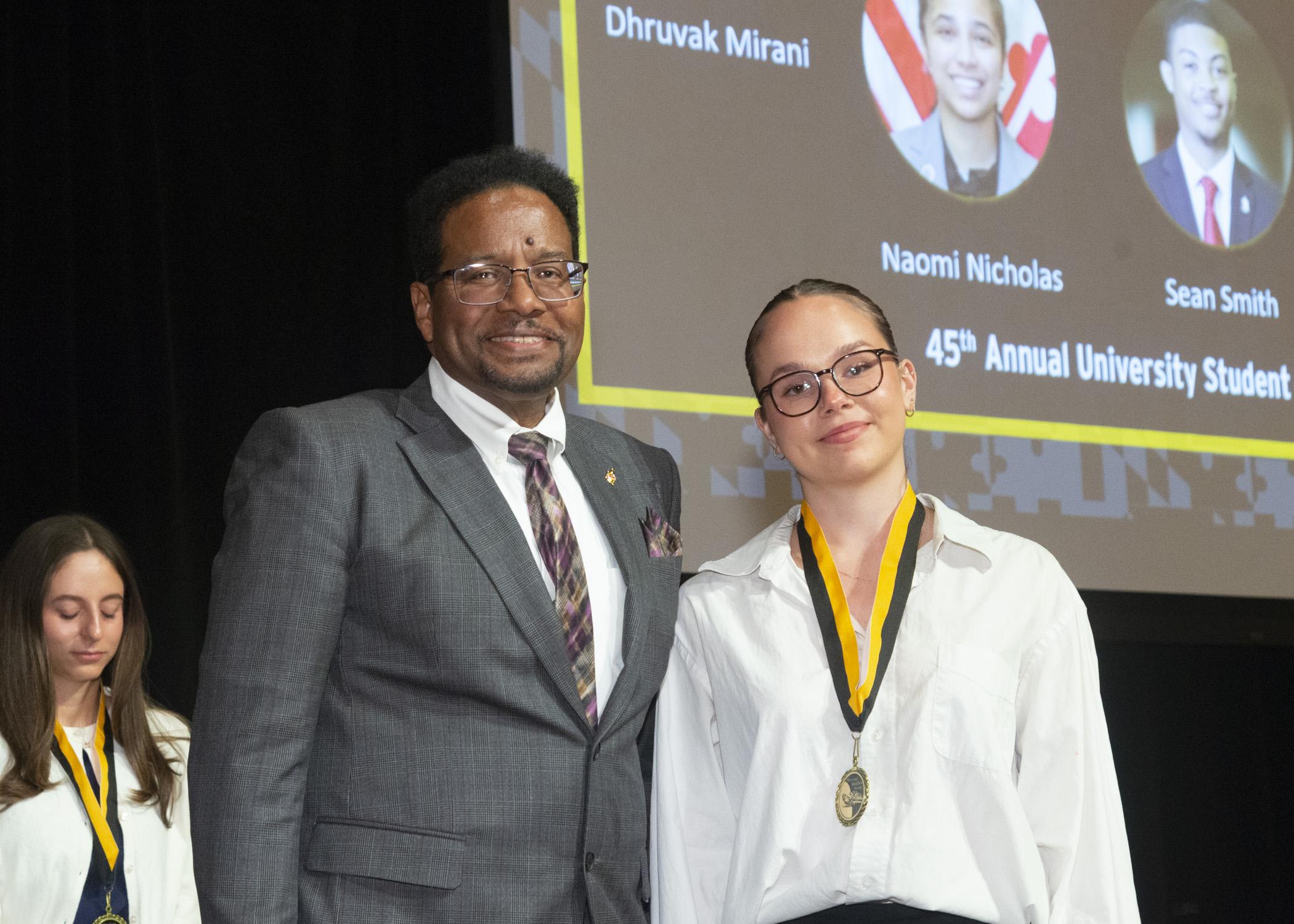 President Pines and a member of the maryland medallion society
