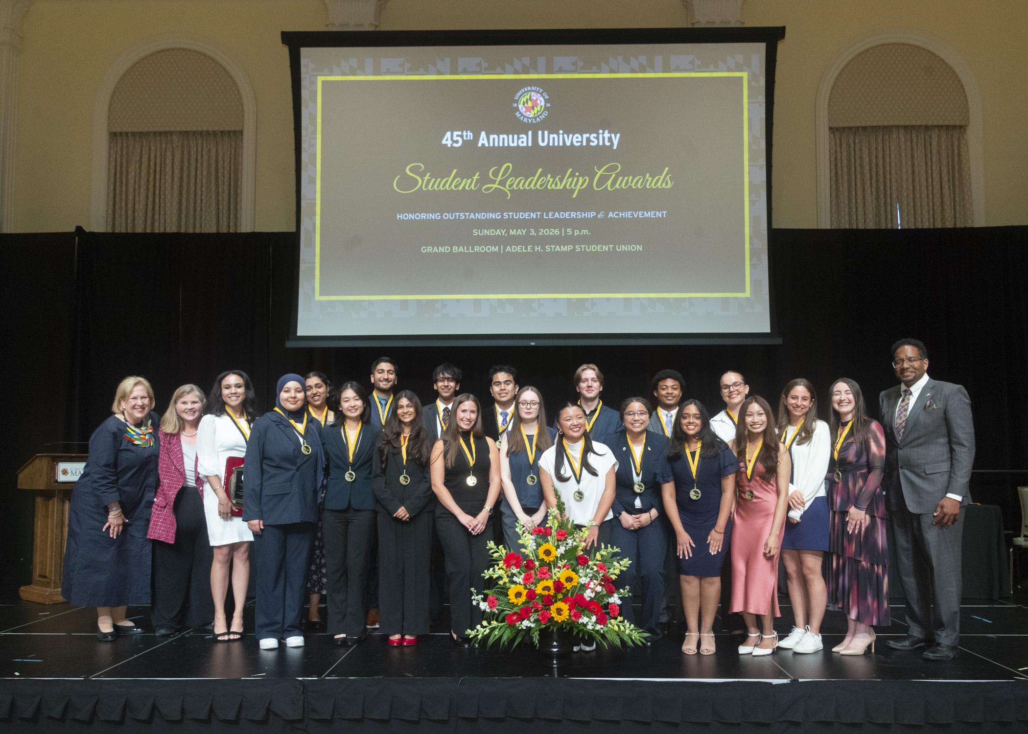 A photo of the twenty 2026 Maryland medallion society members along with Dr. Marsha Gunenzler-Stevens, Dr. Patty Perillo and President Pines