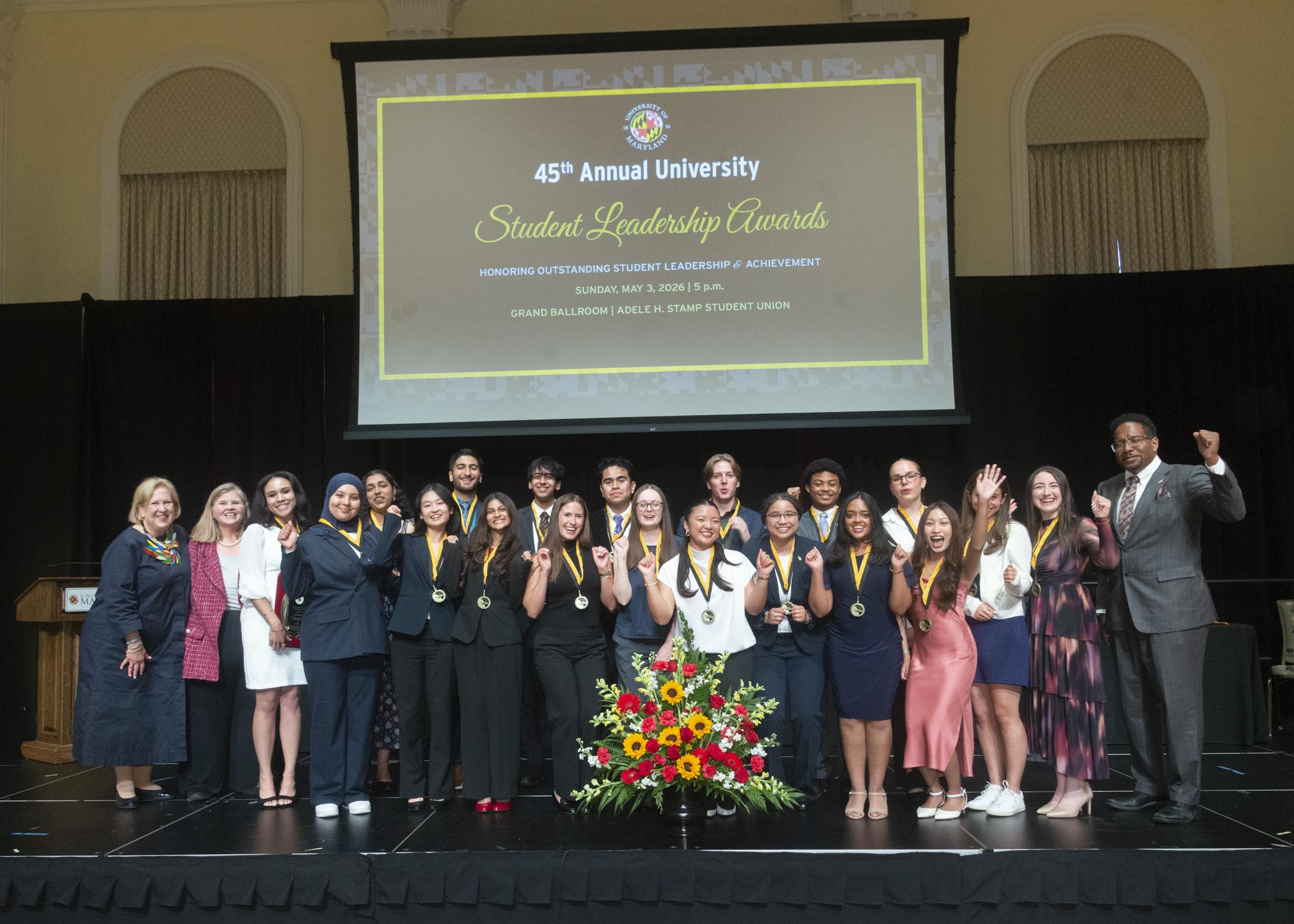 A photo of the twenty 2026 Maryland medallion society members along with Dr. Marsha Gunenzler-Stevens, Dr. Patty Perillo and President Pines