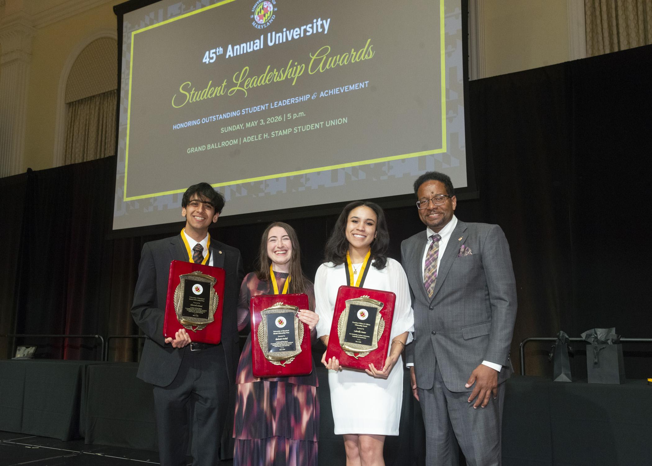 A photo of President Pines, the Wilson H. Elkins Award recipient and the two Model Citizenship Prize recipients