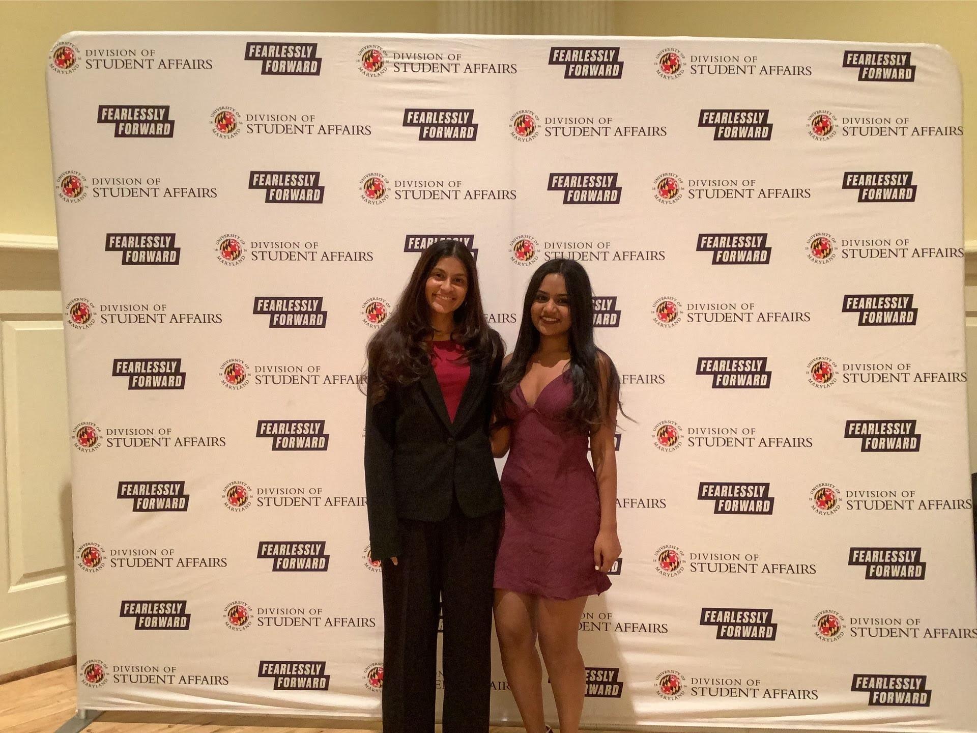 A photobooth photo of two award recipients