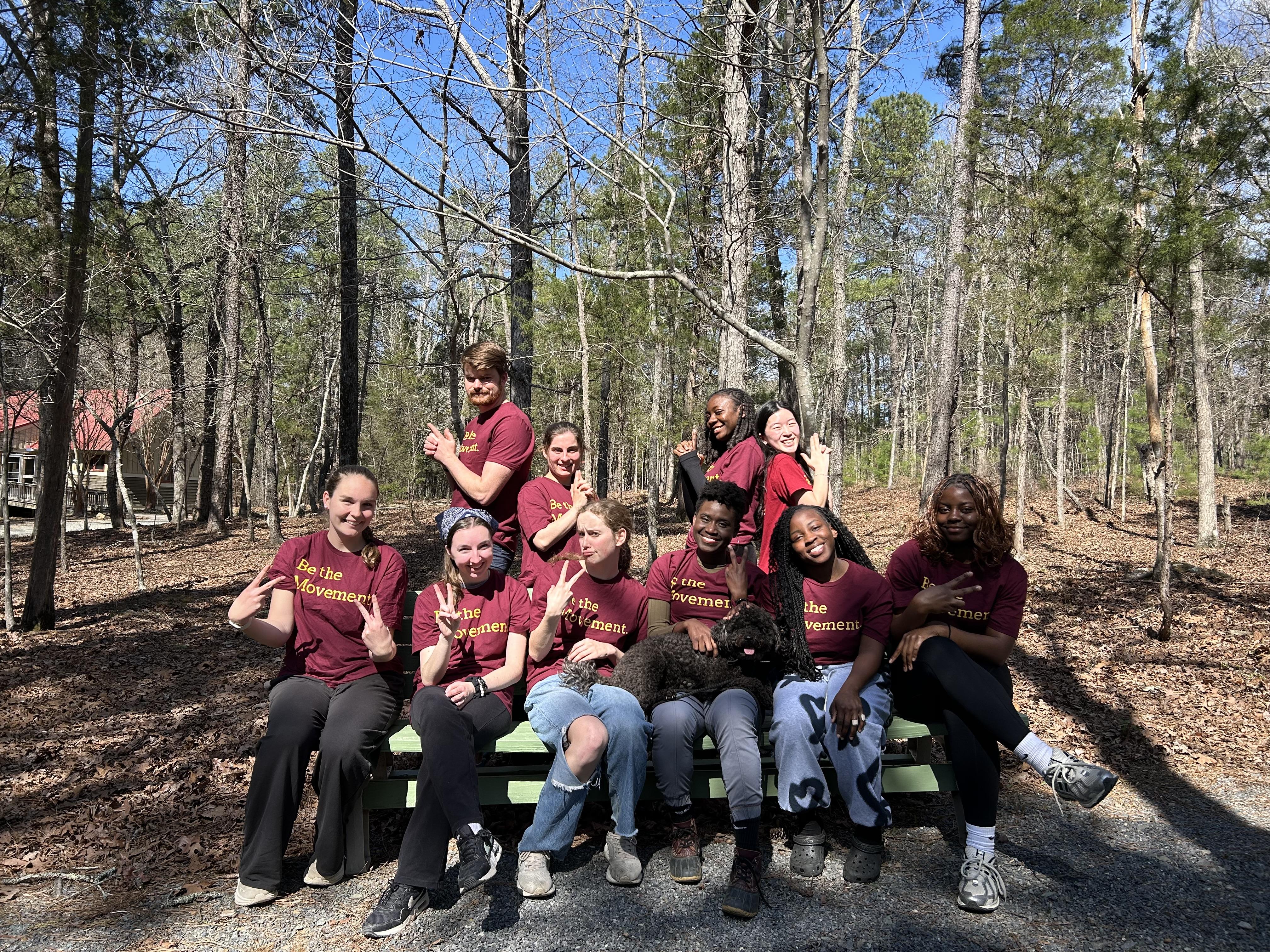 An AB team poses for a silly photo together