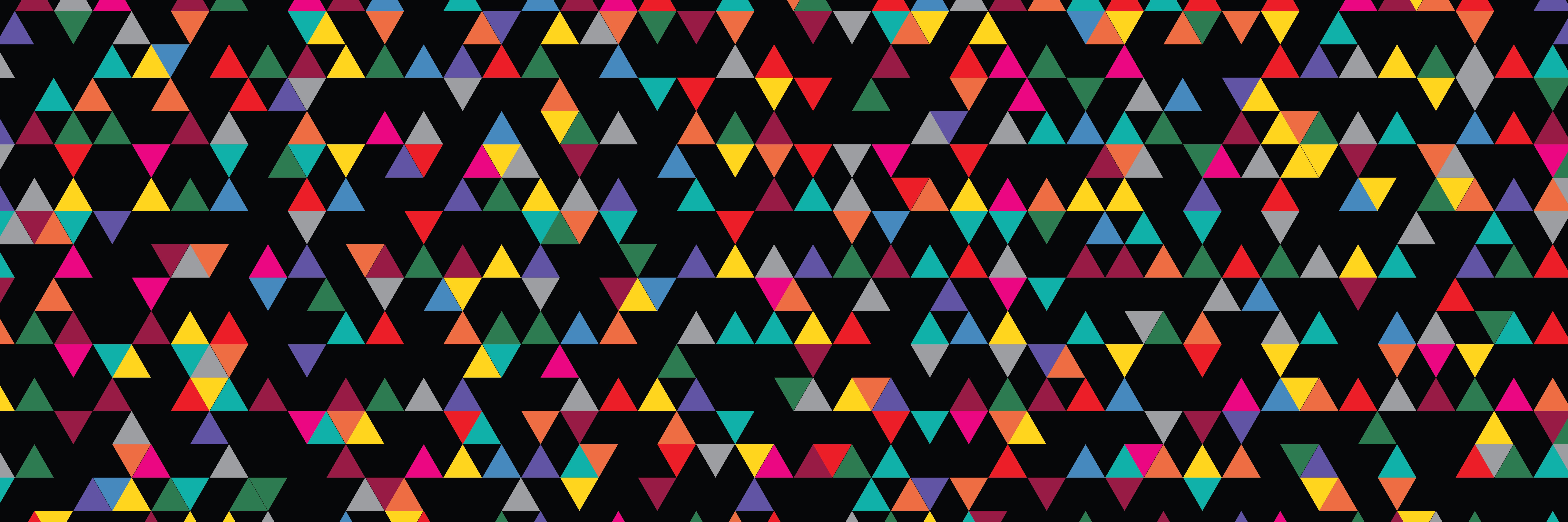 Graphic showing many multicolored triangles on a black background
