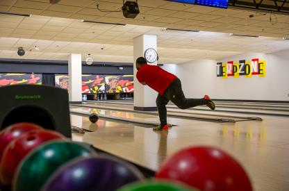A person bowling at Terpzone.